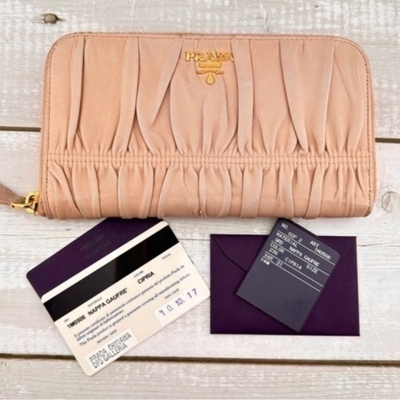 Prada Handbags - Prada Vintage GUC Nappa Gaufre Zip Around Wallet.